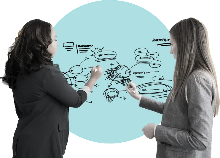 Two professionals at a whiteboard